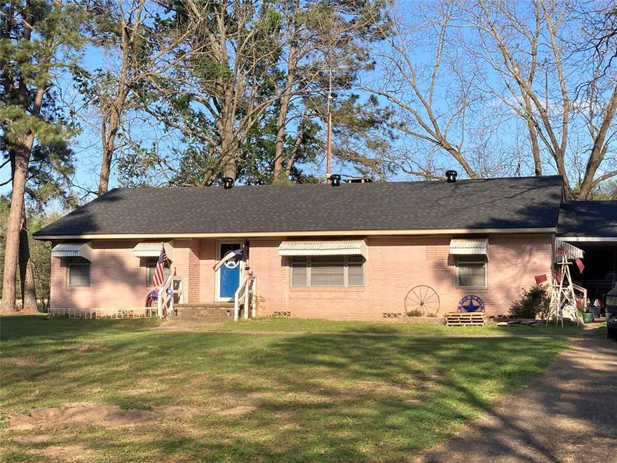 Lake Community!! This property will have a brand new roof and is situated on a spacious 6 acre lot in between Monticello and Lake Bob Sandlin, this property includes a separate building that can be used for a business, extra storage, or your personal creative space. In addition, the property features a classic barn and a grain barn, adding character and functionality. The home is cross-fenced, has two entrances providing privacy and security for pets or livestock, and includes an RV hookup with septic, perfect for accommodating visitors or for your own use. The kitchen is a true highlight, featuring a gorgeous apron sink, butcher block countertops, and elegant granite finishes. Whether you're preparing meals for your family or entertaining guests, this kitchen is both functional and stylish. The flooring is a mixture of real hardwood and beautiful brick flooring. With plenty of space, both inside and out, this property offers endless opportunities to suit your lifestyle. Don’t miss out on this traditional ranch home with lots of vintage character.