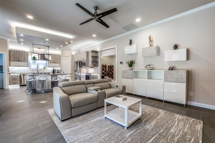 If you’re looking for a stunning, fully furnished & move-in ready rental with flexible lease terms then look no further! This single story home welcomes you with lush landscaping & curb appeal. Upon entering you'll find an open layout with modern upgraded lighting fixtures, designer ceiling fans & ceramic tile flooring throughout for easy maintenance. Entertain in the chef’s kitchen featuring a large island, quartz counters, tons of cabinet space for storage, gas cooktop with a vent mechanism, reverse osmosis filtration, water softening system & built-in wine cooler that flows seamlessly to the family room with decorative fireplace & access to the back patio. Large master with upgraded en-suite bath including dual sinks, oversized frameless designer shower & walk-in closet. Relax on the back patio overlooking the grassy area & trees. Convenient location with easy access to major highways & close to parks, shopping, dining & more. Monthly rent includes yard maintenance & all bills!