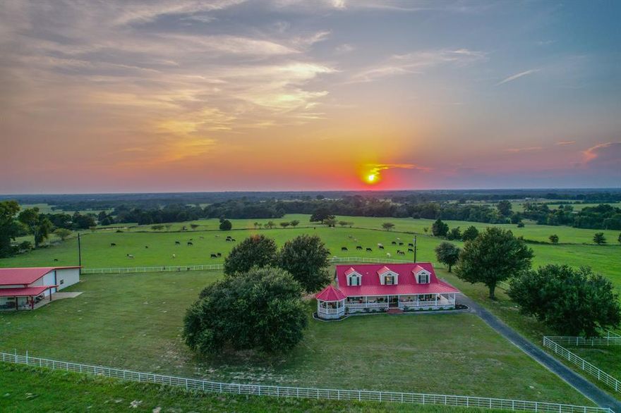 Discover this breathtaking hilltop property, complete with a charming home perched at the top, offering front porch views for miles and unforgettable sunsets. Rolling elevation defines the land, perfectly suited for hay production and cattle grazing with improvements already in place. Multiple ponds provide ample water and fishing opportunities, while a live creek and wooded areas create prime habitat for whitetail deer, hogs, and small game.
The property features extensive road frontage, a long private asphalt driveway, and striking white pipe fencing leading to the home. A large metal building provides implement storage and includes a small apartment area for added versatility. With unmatched hilltop views, excellent wildlife, and impressive functionality, this showplace in the desirable area of “Big Rock” must be seen in person to truly appreciate its beauty.  Call today to schedule your own private showing!

2,924 sq ft 4 BR 3.5 BA Hilltop home with sweeping views 
Rolling elevation, excellent for hay & cattle
Multiple ponds for water & fishing
Creek & woods with abundant wildlife
Long private asphalt drive, white pipe fencing
Large metal building with implement storage & apartment
Showplace property in a desirable area
Boundaries in yellow approximate and to be verified by survey