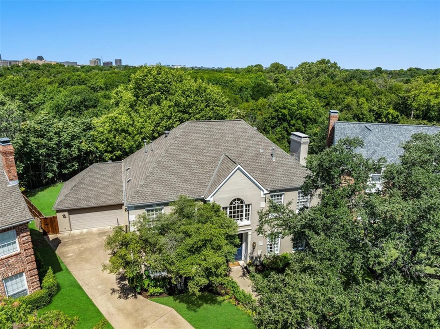 Welcome to 7215 Abrams Place Court — a stunning Lake Highlands home where timeless elegance meets everyday comfort. Nestled on a quiet cul-de-sac backing to a lush greenbelt, this beautifully maintained residence offers backyard privacy and views unlike any other setting in Lake Highlands - and all within the highly acclaimed Merriman Park Elementary zone.

A two-story entry welcomes you with soaring ceilings and natural light, leading to formal living and dining areas, plus two additional living spaces and a wet bar, perfect for entertaining. The eat-in kitchen features a large island, abundant cabinetry, walk-in pantry, and built-in desk, with doors to a private grassy area gated from the pool and spa. A utility room with fridge, sink, and built-ins connects to the kitchen, alongside a two-car garage for convenience.

Upstairs, the primary suite includes dual vanities, a soaking tub beneath a skylight, separate shower, and two walk-in closets. Two secondary bedrooms share a Jack-and-Jill bath, while a fourth room near the primary suite serves as a study or optional nursery. The third floor offers a very large bonus suite (25’4” x 15’8”) with fresh paint, closets, and full bath — an ideal, private guest suite with added flexibility as a play or game room. Two half baths, including one connected to the pool area, add convenience for family and guests.

French doors from the main living room open to a covered patio overlooking the pool and greenbelt, creating seamless indoor-outdoor entertaining flow. High ceilings, abundant light, and thoughtful updates throughout make this home a perfect balance of comfort, style, and functionality, just minutes from White Rock Lake, parks, and trails.