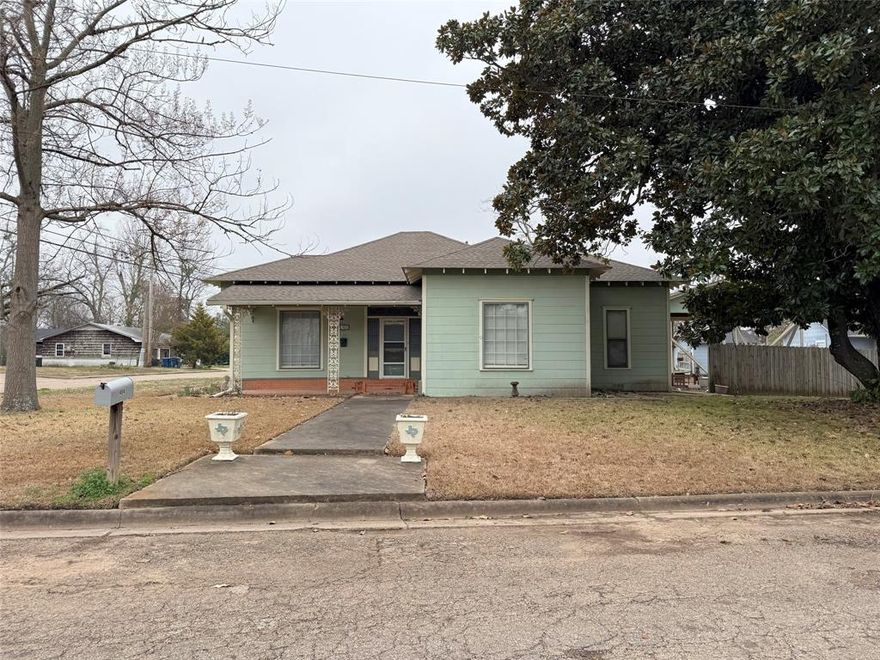 Charming older home in Winnsboro, Texas, and within walking distance of downtown and the Farmer's Market. This 3BR-2BA home has large bedrooms, 2 living areas and is just waiting for the handy man buyer as it is being sold 'As Is'. The home features 9 and 11 foot ceilings, large galley kitchen, 2 covered patios and lots of room with the corner lot. 10x20 Storage building and 19x22 covered porch. The owners also used part of the 2 car carport as a patio. Come and take a look.