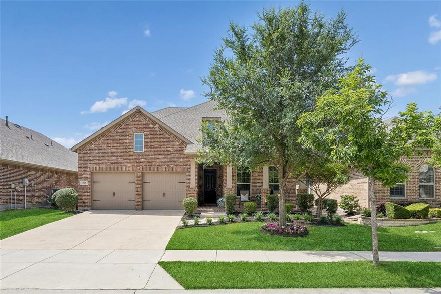 Beautiful north-facing 2016 Highland-built home in the very popular Prosper ISD.  This wonderfully maintained home with a bright, open and flexible floor plan is designed for modern living and effortless entertainment. Highly desirable features include vaulted ceilings, Hickory engineered hardwood flooring throughout both levels, a stone fireplace, and a kitchen with granite countertops, large island, and stainless-steel appliances, plus porcelain tile in the guest bath, primary bath, and utility room. Recently painted in calming, natural tones with designer accents. The enormous first-floor primary suite is separate and private, easily accommodating a sitting area for a true retreat. All secondary bedrooms offer walk-in closets, with one on the first floor, ideal as a study or guest room. Abundant storage throughout, including additional garage space. Upstairs features a large game room, 3 bedrooms, and 2 baths. The backyard is large enough for a pool with green space remaining for pets and play. Enjoy a large covered front porch and partially covered back patio, perfect for relaxing or hosting. Full roof replacement in 2025. Community amenities include 2 pools, playgrounds, and parks, a community center with fitness area and gathering space. Zoned for sought after Richland HS and conveniently located just minutes to the PGA, North Dallas Tollway, numerous restaurants, shopping, and everyday conveniences.