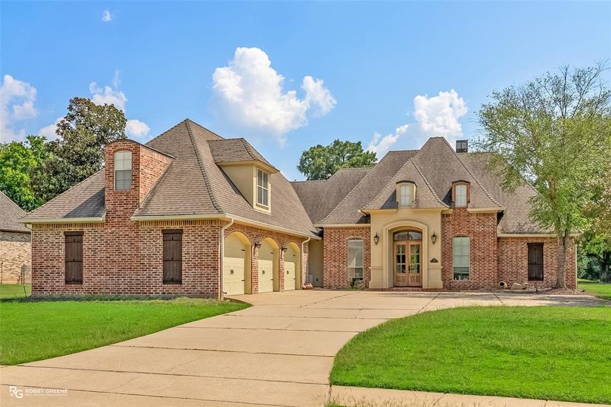 Elegant 4BR 3BA 2Half Bath home with 3,677 sq ft in the prestigious gated Stonebridge Subdivision. Half acre lot that backs up to the 13th green and 14th tee box! Featuring a French-inspired brick façade and three-car garage, this home blends timeless design with modern comfort. The open floor plan boasts soaring ceilings, crown molding, and abundant natural light. A spacious living room with custom built-ins and fireplace flows into the gourmet kitchen with granite counters, stainless appliances, double oven, breakfast bar, and cozy banquette dining. The luxurious primary suite offers dual vanities, soaking tub, and walk-in shower. Upstairs, a large bonus room with custom cabinetry is ideal for a media room, office, or play space. Outdoor living is enhanced by a generous backyard with mature landscaping. Stonebridge amenities include golf, tennis, and a country club lifestyle in a secure, gated setting. Seller is offering 25k Upgrade Bonus with accepted offer! Call today for your private showing!