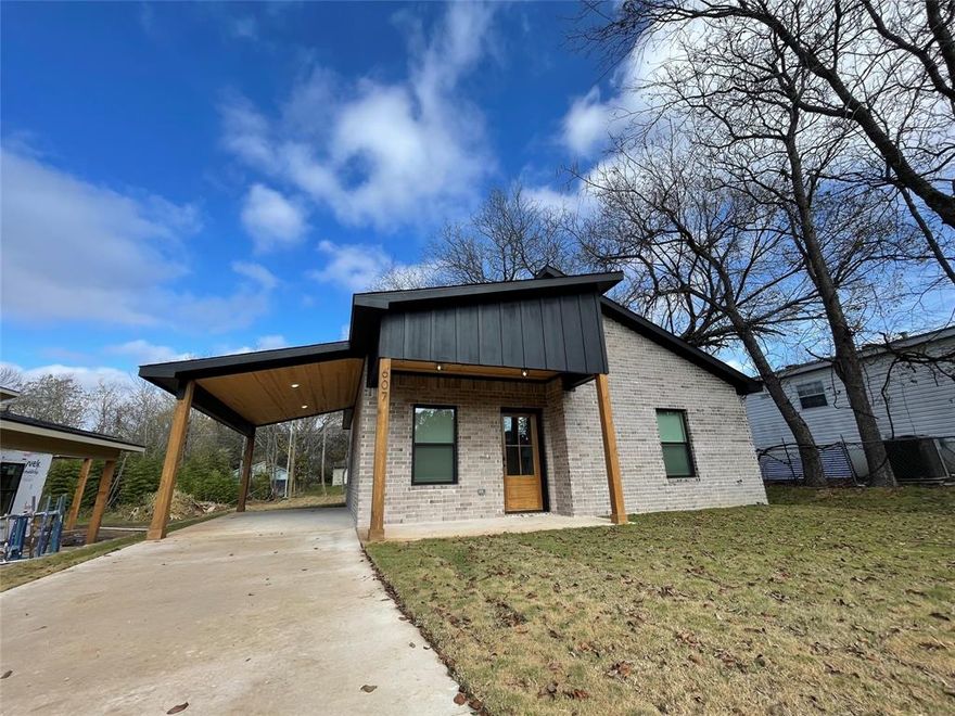 This brand-new EarnhartBuilt home is now COMPLETE and move-in ready! One of the last remaining homes in this community that includes a covered carport, this property offers rare convenience and exceptional value. Owner financing is available, making this an even more accessible opportunity for buyers.

Located in the rapidly growing town of Denison, this 3-bedroom, 2-bath home delivers modern design, energy-efficient construction, and long-lasting durability. Enjoy an open-concept layout with 9-foot ceilings, recessed lighting, polished concrete floors, and a bright kitchen featuring quartz countertops and energy-efficient aluminum windows.

Built with spray foam insulation, 2x6 exterior walls, and an efficient heat-pump HVAC system, this home is engineered for low utility bills and year-round comfort. The fully insulated attic adds additional efficiency and performance you won’t find in most homes at this price point.

Every EarnhartBuilt home comes backed by a 10-year warranty for added peace of mind. Located just minutes from downtown Denison, schools, shopping, and a short drive to Lake Texoma, this home offers both convenience and investment upside in a rapidly developing area.

Opportunities like this don’t last—especially with owner financing available. Contact your favorite agent today before it’s gone