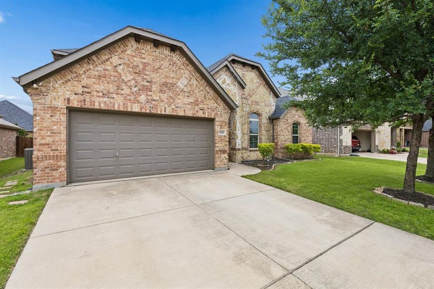 Gorgeous John Houston custom home in Shannon Creek. Features include 4 bedrooms, 2.5 baths, large living with beautiful stone fireplace and hand scraped wood floors. Spacious kitchen with custom cabinets, island and granite counter tops. Bonus room upstairs with half bath could also be used as a fifth bedroom. Master suite includes huge master bath with garden tub, separate shower, walk in closets and connects to utility room. Fenced yard with large covered porch.