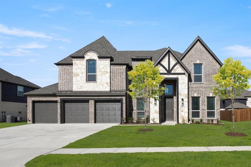 MLS# 21092568 - Built by First Texas Homes - Ready Now! ~ Discover this stunning 5-bedroom, 3.5-bath home with a spacious 3-car garage and 3,639 sq ft of beautifully designed living space. Entertain effortlessly with an 18-foot flat ceiling, a striking 60 linear fireplace, and sliding doors that open to an expansive back patio—ideal for BBQs and gatherings. The gourmet kitchen features upgraded stainless steel appliances, a built-in butler’s pantry, a 36 5-burner cooktop, shaker cabinets, quartz countertops, and stylish lighting throughout. The primary bath offers a freestanding tub, large shower, and modern fixtures. Upgraded wood floors grace the first floor, with plush carpeting upstairs. Fully landscaped and move-in ready—schedule your tour today!