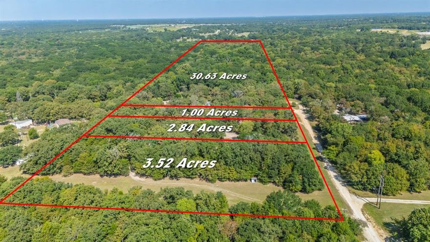 HIGHLY MOTIVATED SELLER- OPEN TO ALL OFFERS!  PRICE IMPROVEMENT-$700,000. 
Your Private Slice of Heaven! Tucked away in a peaceful, secluded setting, this rare property offers endless possibilities! Sitting proudly on 37.98 acres of natural beauty, this charming mobile home comes with 3 additional lots—for a total of 37.98 acres of picturesque countryside. 
Wake up to the magic of nature—imagine sipping your morning coffee as deer and wildlife wander right outside your window.
This property is more than just land—it’s a lifestyle! You’ll find a LARGE garage perfect for storage, a workshop, or hobbies. A classic red barn and a mini 2-horse stall. A fenced area ready for goats, chickens, or any animals you love.
FOUR parcels, each with its own well—giving you self-sufficiency, lower utilities, and the ability to tailor water to your needs with simple treatment
The home itself has been gently lived in, offering comfort while you make it your own. Inside you'll find new wood flooring that enhance the open floor layout, along with a split bedroom concept for privacy when needed. You'll love the fireplace just in time for the cooler days ahead. 
With nearly 38 acres of opportunity, you can farm, garden, keep animals, or simply enjoy the quiet life. This property presents endless opportunities for outdoor enthusiasts and those seeking a peaceful lifestyle. 
Enjoy the convenience to Highway 276 and I-30 while being minutes away from Lake Tawakoni, shopping and city amenities. 
Don’t miss this chance to secure your own retreat. Come fall in love with your forever getaway!