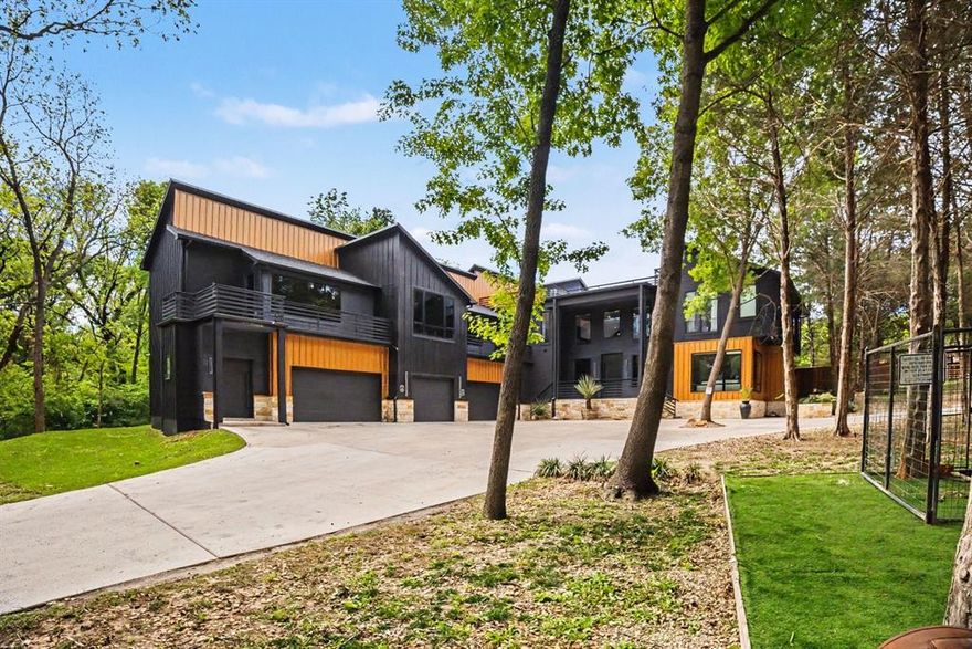 Welcome to a truly impressive estate offering over 7,300 sq ft across three levels on a sprawling 2-acre lot, designed for those who crave space, style, and the ability to live and entertain without limits. Inside, high ceilings create a dramatic, open feel with sight-lines that extend to an upper level catwalk, while a striking fireplace anchors the main living area. The kitchen is a showstopper, featuring quartz countertops, a waterfall island, a separate dining island, and cabinetry that extends to the ceiling, along with a spacious pantry for maximum storage. The main level also includes a dedicated home office and a theater-media room, creating the perfect balance of productivity and entertainment. Upstairs, a loft space adds even more flexibility, while multiple laundry areas, including an additional connection in the primary suite takes everyday conveniences to a whole new level. The primary suite is a true retreat, complete with recessed lighting, a statement wood accent wall, fireplace, and abundant natural light. The ensuite bath offers dual sinks, built-in storage, a large walk-in closet, and a spacious tiled shower designed for comfort and style. Discover outside to your own private oasis, an in-ground pool, patio, and fenced backyard set against a serene 2-acre backdrop, plus a rooftop deck that elevates your outdoor living experience even further. Conveniently located near I-35E and I-20. Enjoy nearby shopping, dining, and entertainment options in Lancaster, DeSoto, and southern Dallas, along with local parks and outdoor spaces that enhance the lifestyle this property offers. With unmatched square footage, luxury features, and endless room to make it your own, this is more than a home, it’s a destination. Schedule your private tour and experience it for yourself. Discounted rate options and no lender fee future refinancing may be available for qualified buyers of this home. Some images are Virtually Staged.
