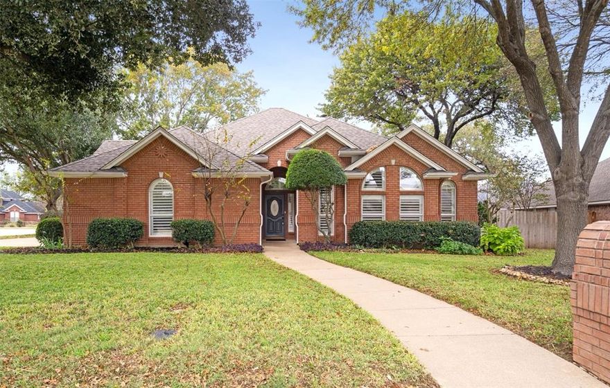 Freshly updated and beautifully cared for, this 4-bedroom, 2-bath home sits on a spacious quarter-acre corner lot and offers the perfect blend of style, comfort, and convenience. Step inside to an inviting open layout with vaulted ceilings and seamless sight lines from the living room to the dining area, creating a bright, connected space ideal for both everyday living and entertaining.

Recent upgrades add tremendous value, including a gas tankless water heater, updated hardware and shutters, new kitchen appliances, and a fully remodeled guest bathroom. In 2022, the sellers replaced all window glass and refreshed the exterior paint. Even better—the entire roof and HVAC system were replaced in 2021, offering peace of mind for years to come!

The chef-inspired kitchen anchors the home with generous counter space, updated appliances, and effortless flow to the main gathering areas. The thoughtful split-style layout places the primary suite in its own peaceful corner, complete with built-ins for added function, while the secondary bedrooms remain nearby yet well-separated for privacy and practicality. Outside, the expansive backyard is a true bonus—featuring a brand-new fence and plenty of room to relax, garden, entertain, or design your dream outdoor retreat. 

Lovingly maintained by only its third owners over 25 years, this smoke-free home reflects pride of ownership throughout. Located near top-rated amenities and within highly acclaimed Mansfield ISD, this property offers exceptional livability in a prime location!