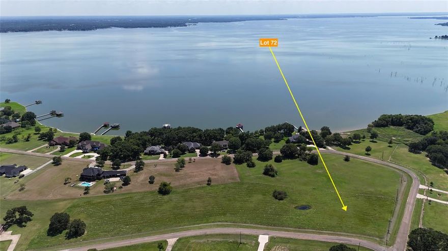 Dreaming of lake life? This 1.12-acre corner lot in the sought-after Arrowhead subdivision is calling your name—and yep, it’s got those front and back water views of Richland Chambers Lake! With nearly 49,000 sq. ft., you’ve got all the space you need to spread out and make it yours… build that custom lake house you’ve been picturing, add a pool, outdoor kitchen, fire pit, maybe even a big ol’ porch swing to catch the breeze and it all fits here. Arrowhead keeps it easy with a gated entrance, paved private roads, boat ramp, and community mailboxes, plus you’re in the top-notch Mildred ISD. And let’s not forget Richland Chambers—it’s the 3rd largest lake in Texas, loved for its awesome fishing, boating, and laid-back weekends that somehow always turn into full-on memories. Bonus? You’re only 15 minutes from historic Corsicana for a little shopping, dining, and small-town charm when you want it. And here’s the kicker: optional neighboring lots are up for grabs too! So whether you just want your own slice of lake heaven or you’re ready to go big and scoop them all up, you can create the ultimate lake life playground with plenty of room for family, friends, and all your water toys.