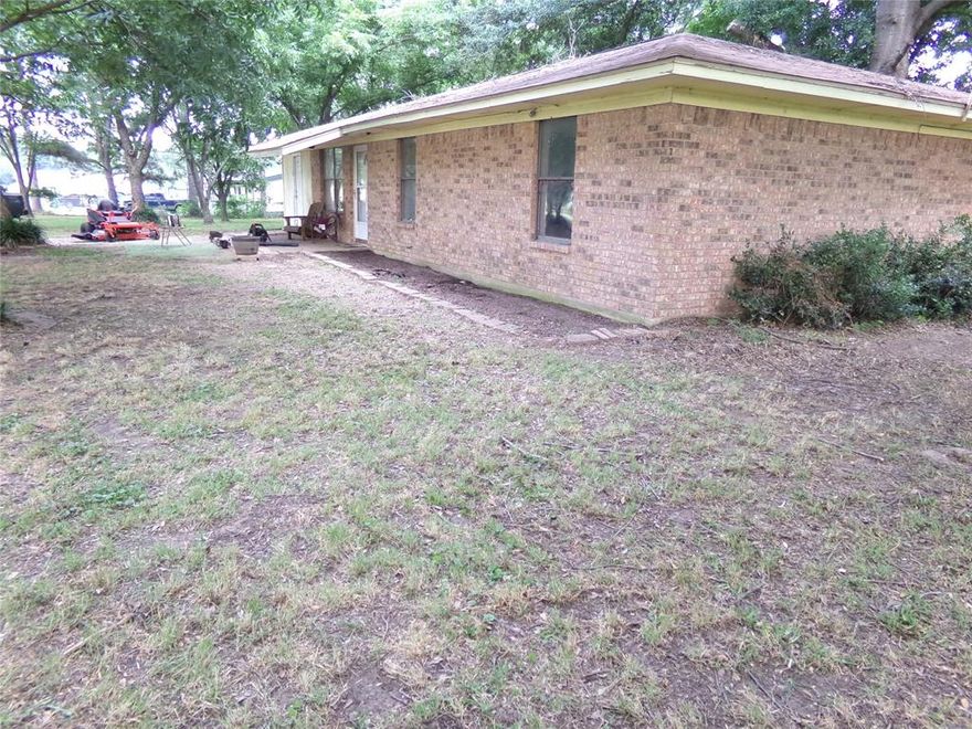 Another HUGE PRICE DROP...PRICED TO SELL.       On this 1 acre you will be in pecan tree paradise. Featuring 25 pecan trees and 4 oak trees there is enough shade to go around. Plenty of yard space for backyard entertainment or playground equipment. The property is fenced all the way around with a front gate. Only 2 miles from the lake and boat ramp. Only 5miles from Walmart and only 2miles from brookshires. The brick home is a 3 bedroom 1.5 bath with another large room that can be used as a fourth bedroom, game room, office etc. AC was replaced a year ago, septic replaced in 2015, roof was replaced in 2013, and water heater replaced in 2020. Another thing that can be enjoyed about this home is the nice size utility room with cabinets, an eat in kitchen, 2 sheds, and concrete front and back patio slabs to sit and enjoy the outdoors. The full bathroom has been recently renovated and it is beautiful. Schedule your appointment today and make this home your own.
