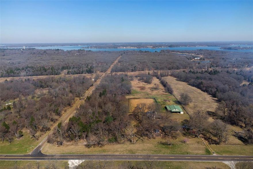 Bring your horses or livestock. No Deed Restrictions.  Over 9 fully fenced acres with barn,  ideal for large livestock . The entire acreage has perimeter fence. Cross fencing, for example, one acre chain link for goat etc...  4 Stall Horse barn with tack room Plumbed for animal grooming incl hot water. 2nd living quarters is one lg room with bath attached to another large storage bldg. 3 pastures. One pond. Next to home is extra large fenced area for chicken or dog run. Roof is under 4 yrs old.  Baths updated a yr ago.  Parquet wood tile in living room.  Kitchen features dishwasher, smooth range cooktop, and overhead microwave.  Recessed lights.  Water well and septic.  This property is out of the city limits but down the road from Malakoff Highschool, about a 2 min commute. Also shopping, bank, feed store and conveniences are about 5-7 min away. Public Boat launch to Cedar Creek lake is also close by. Priced significantly below tax assessed value of 579k. For a quick sale, seller will consider offers.