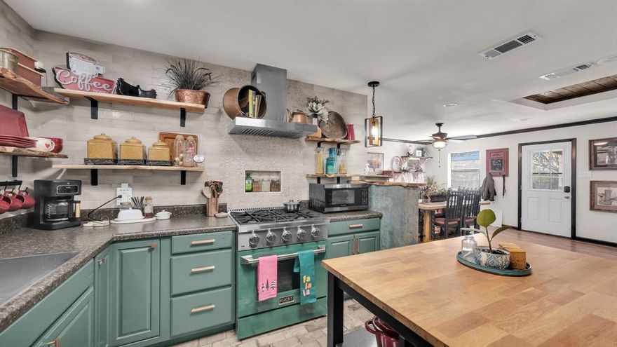 Calling all STR investors! This house is in the historic overlay map district that is required to be ELIGIBLE FOR SHORT TERM RENTALS.  It has recently been transformed into the cutest rustic eclectic home!  USA TODAY Best Historic Small Town in America awarded multiple times, including in 2019, 2020, 2021, and again for 2025.  There are festivals and events happening on the square all the time! The annual festivals can be found on the city website under festivals.  Great opportunity for a primary home owner as well.  Walkable to the square, about 10 minutes. Quiet and cozy neighborhood in Central Granbury.  The coolest garage expansion with the rails and door still intact. Come and see for yourself!