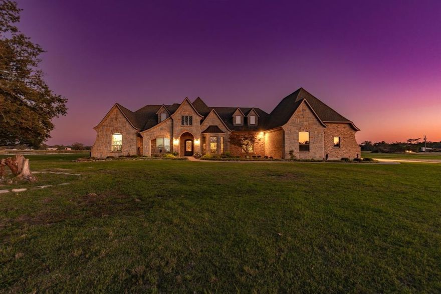 Incredible 102 acre ranch only 30 miles from Dallas, w Custom Stunning stone luxury 3-3-3 home. Property is unmatched with lush
 coastal Bermuda pastures with scattered majestic oak trees & 10 ac lake. Home features large family room, large master bedroom, 2 living areas, 3rd bedroom serve as second master with den. The ranch boasts a 10 acre lake on property.
There is a spare home on property. Property has pipe fencing, cross fenced, insulated barns 60X50 & 4 stall 100X40 horse barn with tack room & hay storage.
Escape the city, enjoy peaceful nights at this beautiful ranch home.