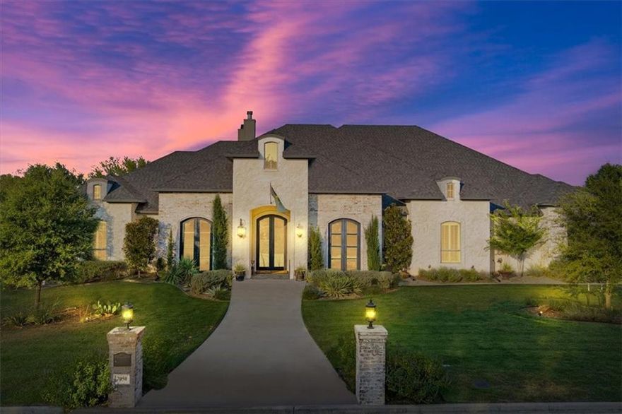 Nestled within the quiet streets of Hidden Valley, 7050 Ledge Stone emerges as an exquisite abode, exuding opulence across its expansive 6,006 square feet of living space originally constructed by Loera Homes.

Upon entry, the grandeur of the foyer merges seamlessly with the awe-inspiring vistas that grace both the interior and exterior of the property. Bespoke fixtures, sixteen-foot ceilings, custom-milled windows, architectural finesse, and incredible efficiency are consistent themes you'll find in every inch of this unparalleled residence.

The primary suite, a secluded haven, boasts lavish amenities including a capacious butler's pantry and coffee bar replete with a wine fridge and sink. His and hers separate walk-in closets, complete with an island and meticulously crafted built-ins, flank the suite, while a freestanding tub, dual vanities, and an indulgent walk-in shower elevate the en-suite experience. A recent addition to the primary wing unveils a tranquil patio, crowned with a vaulted ceiling, accompanied by an Italian Valoriani brick oven – perfect for savoring authentic pizzas and enjoying this peaceful outdoor space.

For culinary enthusiasts, the grand kitchen fulfills every aspiration, housing a walk-in pantry, a center island, Monogram appliances, a six-burner gas stove, a pot filler faucet, a double oven, a coffee bar, bar seating, and a prep sink.

The game room, an entertainer's haven, offers a built-in bar and island, seamlessly flowing into the outdoor spaces encompassing the backyard, patio, and the contemporary heated pool and spa, ensuring year-round enjoyment.

The charming backyard provides an eastern perspective that casts ample shade over the patio, outdoor kitchen and sink space, gunite pool, and spa. The outdoor kitchen space also delivers a grilling area, refrigerator, and granite countertop serving bars. Encircled by exquisite landscaping, the pool ensures a tranquil retreat, fashioning a secluded oasis entirely your own. Mi