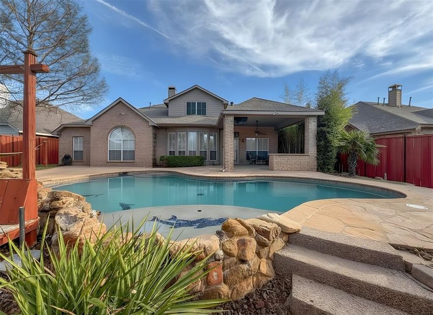 This beautifully designed home offers an exceptional floorplan with the convenience of primarily single-story living. All bedrooms and living spaces are located on the main level, with spacious game and media rooms upstairs.

The home features 4 bedrooms, 2.5 bathrooms, 2 dining options and a dedicated office. The kitchen is a standout, boasting a large island, plenty of storage and recently updated appliances. The primary suite has been remodeled to create a luxurious spa-like experience, including a granite countertops, freestanding soaking tub and an expanded frameless glass shower with updated tile work.

Step outside to your private backyard oasis, complete with a resort-style pool featuring a waterfall and attached spa, along with a fully equipped outdoor kitchen offering a built-in gas grill, mini refrigerator, stainless steel storage, bar seating, and a ceiling-mounted TV—perfect for entertaining year-round.

Major Updates & Features Include:

New roof (2024)
Hot water heater (2026)
Main HVAC replaced (2022) with WiFi thermostat; upstairs unit (2019)
Garage door opener with WiFi (myQ)
Irrigation control system (2023)
Gas fireplace insert with remote (2023)
Extensive pool equipment updates, including new heater (2024)