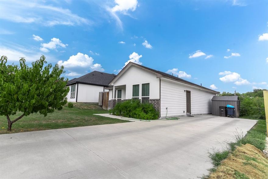 New Energy Efficient Contemporary Home with an open floor plan and 9 foot ceilings. Kitchen has tall cabinets , large Island bar with apron front sink 32 in by 17 in. Bathrooms have soft close drawers and extra large bathtubs. Home features recessed lighting and a ceiling fan in living room. The Tankless Hot Water Heater will never let you run out of HOT Water. The extra foam insulation on all exterior walls will reduce your energy bills and it is fire retardant. *Remodel guest shower.