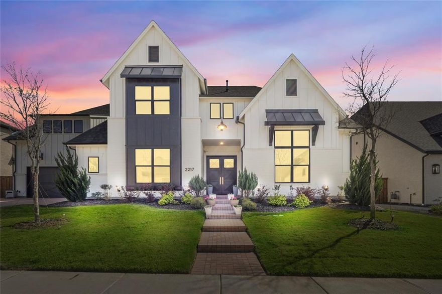Why wait to build when you can have it all now? Fully upgraded, move-in ready luxury home with $20K incentive towards rate buy down or closing costs and premium features already included. Located in the highly sought-after Mustang Lakes community with resort-style amenities and Prosper ISD. Experience elevated living with this exceptional north-facing luxury home built in 2023. Offering 6 bedrooms, 6.5 baths, and over 5,300 square feet, this home delivers the space, design, and functionality today’s buyers are searching for without delays or the upgrade expenses of building new. Step inside to soaring ceilings, beam accents, designer lighting, and expansive open-concept living spaces that flow seamlessly from the gourmet kitchen to the family room and outdoor living area through dramatic sliding glass doors. The chef’s kitchen features upscale finishes, abundant prep space, and a premium Thermador refrigerator and freezer that convey an upgrade often added at significant cost in new construction. Designed for flexibility, each bedroom offers privacy for guests, work-from-home setups, or multigenerational living, while the spacious primary suite provides a spa like retreat. This home stands out with true turnkey value, including a whole-home shades, Back patio sunshade, Aquasana whole home water filtration system, Epoxy garage flooring, TWO washer-dryer sets, Projector and screen, FOUR mounted TVs (living, primary, game room, backyard)