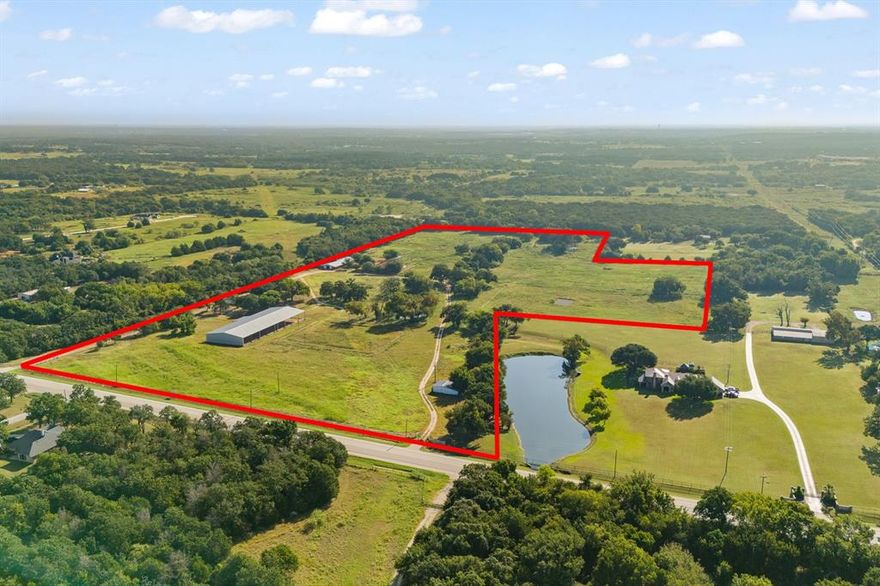 Income producing potential!  This multi use property is perfectly set up as a training and-or boarding facility for horses.  Outstanding location just outside Burleson and approximately 25 minutes to Will Rogers Coliseum.  The property has 2 barns, one with 15 stalls and the other with 10 stalls. The barns also have concrete aisles, tack rooms, offices, wash areas, and storage for hay or bulk shavings.  There are multiple pastures that are fenced and cross fenced, a covered arena, outdoor arena, and RV hookups.  This property is also ideal for hosting horse-related events as there is plenty of parking for trucks and trailers.  The 2930 square foot home features 4 bedrooms and 3 baths, is freshly painted and carpeting was replaced with luxury vinyl flooring.  It has a large, open-concept with living room, dining room with bar, kitchen and sunroom.  There is an office from which to run your facility operation in the quiet of your home.  The primary bedroom is a nice size with French doors that lead to the pool.  The second bedroom off of the kitchen has its own en suite.  The pool patio area is perfect for entertaining and looks out towards the covered arena.  This property is near growing communities and minutes from HEB, Tractor Supply, Home Depot and restaurants making it ideal to attract horse-loving clients looking for the convenient location to enjoy their four legged friends.