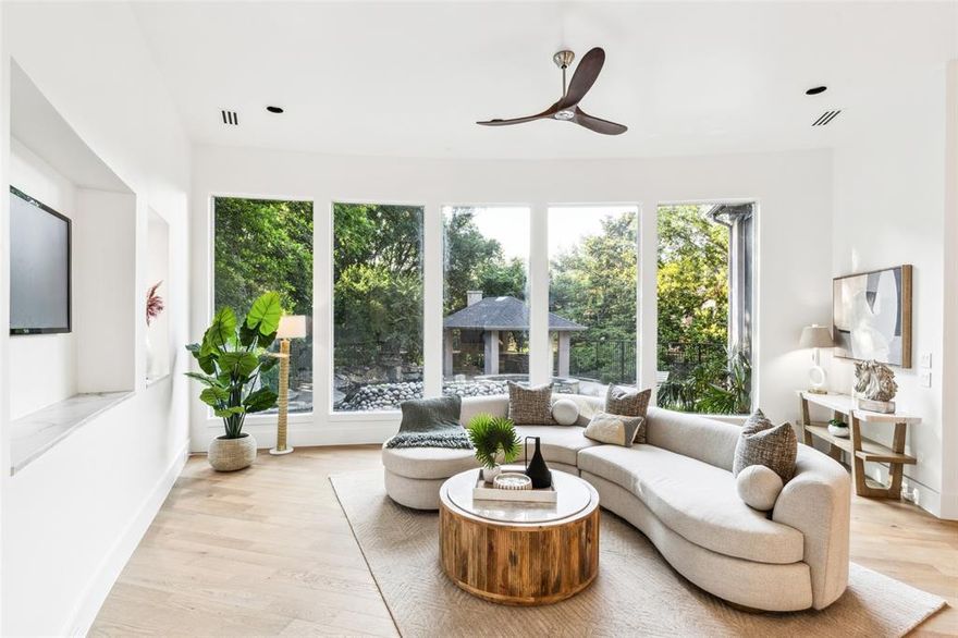 Upstairs remodel just completed September 2025 creating an additional bedroom or flex room, full bathroom, half bathroom and dedicated game room! One of the most incredible properties in all of Plano! Rare find on a gorgeous creek lot with mature trees on a cul-de-sac in the coveted and highly sought-after Shoal Creek neighborhood of West Plano. Remodeled and reimagined for 2025 living. Set on a lush landscaped wooded lot, this remarkable 6,137 sq ft estate showcases extensive updates and expansive indoor-outdoor living, creating a home that is truly made for entertaining. Step through the grand entryway into light-filled interiors featuring 3 generously sized bedrooms on the main level, including a serene primary suite and a private home office. At the heart of the home, the fully renovated gourmet kitchen impresses with custom cabinetry, Viking and Thermador appliances, sleek countertops, and sweeping views of the backyard oasis. The adjacent living and dining areas flow effortlessly, offering 3 distinct living spaces that invite both relaxation and celebration. Beautiful flooring throughout the main level enhances every room, while unique touches like a private patio off the primary bedroom and two additional downstairs bedrooms create a seamless connection to the outdoors. Upstairs has been brilliantly reimagined to add a dedicated game room, a versatile flex room that can serve as bedroom #5 with a full bath or use it as a media room space, plus an additional half bath for guests off of the game room. This level also features a charming reading loft, built in bookcases, a workout space, or creative play areas and lots of storage. Every inch of the home has been designed for both fun and function. Outside, the lushly landscaped grounds are framed by mature trees and feature a sparkling pool with a swim-under waterfall, outdoor entertaining area, fireplace, multiple seating areas, and a grassy play space, perfect for summer parties or intimate evening gatherings.