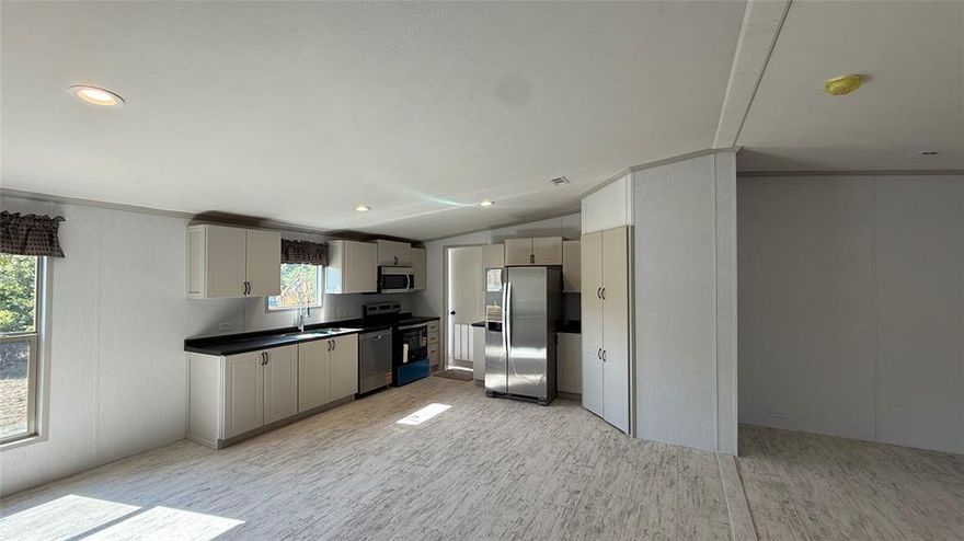 Discover the perfect blend of comfort and style with this brand-new
mobile home. Designed with today’s lifestyle in mind, this residence combines modern finishes with functional living
spaces to create a home you’ll be proud to call your own. The open-concept living area is filled with natural light,
offering a warm and welcoming atmosphere that’s ideal for both everyday living and entertaining. The sleek kitchen
showcases stainless steel appliances, ample counter space, and contemporary cabinetry, making it as practical as it is
attractive. Bedrooms are cozy yet spacious, featuring generous closet storage, while the bathrooms are tastefully
finished with modern touches. Step outside to your private patio, an inviting space for morning coffee, evening
relaxation, or entertaining friends and family. With room for outdoor seating, it’s a great extension of your living space.
This is a rare opportunity to own a brand-new mobile home offering quality, style, and convenience in one package.
Schedule your showing today and see firsthand what makes this property so special!