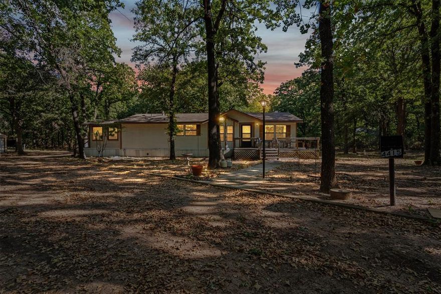 Lake Living Made Easy!
An exceptionally well-maintained home with open floor plan and lots of natural light on a beautiful 1.5 acre lot that is a short stroll to Granbury Lake.  This home has a garage AND covered RV storage with water, electricity and sewage!  Plenty of storage for your lake toys.  Bonus- the HVAC is only 2 years old.  This charming home is nestled in mature trees making this a tranquil weekend retreat or ideal for lake fun.