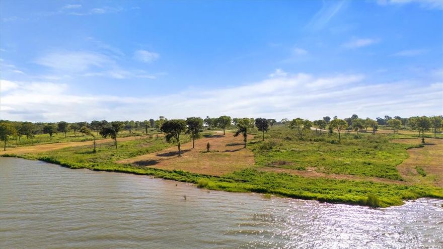 WOW! Unbelievable sunsets and fresh clean air await you at your new lakefront oasis, boasting 135 feet of waterfront. Lot 33, Chambers Bay checks in measuring 1.39 acres, in one of the premiere waterfront subdivisions at Richland Chambers. A short 1 hour drive from downtown Dallas is an easy escape from the concrete jungle. You can almost feel the stress melt away once you cross the FM 2859 bridge as you approach your own slice of heaven on earth. Beyond the gated entry of Chambers Bay subdivision, residents can enjoy a community pool and boat ramp for the exclusive use of its residents. The Chambers Bay deed restrictions require a site built home, with a minimum of 1,600 sq ft.