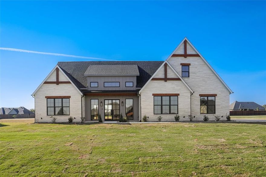 Welcome to Your Dream Home! This 2,840 sq ft Modern Farmhouse blends timeless design with Scandinavian-Inspired elegance, offering both luxury and sustainability. With 3 bedrooms, 3 bathrooms, and a versatile bonus room upstairs, that could also be used as a 4th bedroom, media room or game room. Step through the 8-ft double iron doors into the open concept floor plan. Expansive picture windows allows natural light, while a stone electric fireplace creates a warm gathering place. The spacious primary suite offers direct access to the beautiful 36x12 covered patio and backyard. Kitchen features premium LG appliances, custom cabinets finished with soft close hinges. The oversized fully insulated garage easily fits two vehicles with room left over for a workspace. Built with quality and energy efficiency in mind. Features fully encapsulated OSB sheathing, paired with foam insulation and advanced sealing techniques to minimize air infiltration. A high efficiency AC system with fresh air intake. 80 gallon heat pump water heater for home efficiency. Come take a look at this one of a kind custom home in Paradise ISD~