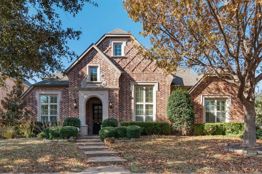 Welcome to 9114 Parson Drive, a stunning 5-bedroom, 4.5-bathroom custom-built home in the master-planned community of Lantana. Spanning 4,688 sq ft on a beautifully landscaped lot, this two-story residence offers timeless charm, functionality, and impressive entertaining spaces. This home is walking distance from Adkins Elementary school. Inside, you’re welcomed by a grand entry, warm hardwood flooring, and elegant plantation shutters. The main living area features built-in cabinets and a striking stone fireplace with gas logs, setting the tone for cozy evenings. The open kitchen is the heart of the home, featuring granite counters, a large island, butler’s pantry, double ovens, walk-in pantry, and abundant cabinet space—ideal for gathering and cooking alike.The main floor includes a serene primary suite with jetted tub, separate shower, dual sinks, and sitting area. A private guest suite is also located downstairs, along with a dedicated home office accented by built-in shelving. Upstairs offers a spacious game room, a full media room with projector and 120” screen, plus three additional bedrooms and two full baths. Step outside to a backyard retreat: a saltwater pool with waterfall and spa, custom-built outdoor kitchen, covered patio with string lights and ceiling fan, and lush, mature landscaping. Whether day or night, this outdoor space shines. Additional highlights include a spacious utility room with sink and storage, dual-zone HVAC, full security system, and 3-car garage. All located just minutes from dining, shopping, and community amenities. 2 New HVACs less than 2 years old, Tankless water heater, and brand new pool pump!