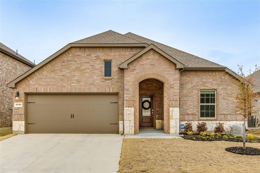 Come see this impeccably maintained one story that feels even better than new!  Wonderful, open floorplan creates inviting spaces and feels much larger than square footage reflects. Tasteful palatte of colors in paint and decor, abundance of windows allowing the sunshine to come in, split bedrooms, creating privacy for primary suite, a roomy primary bath with oversized, free-standing shower and extra shelving for great storage, and an epoxyed garage floor are just a few touches.  Gutters, brick around entire house, roomy covered patio, and pool sized backyard round out the exterior touches.  Neighborhood has community pool and the kids can walk to elementary school.  So nice, just move right in!