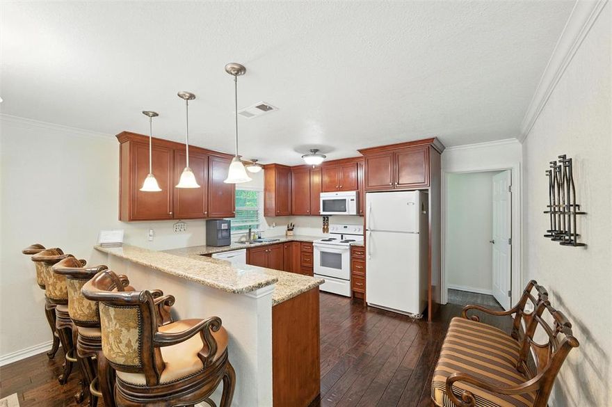 Location!  Location!  Location!  Currently zoned R-20 for residential use. Buyer to verify zoning with the City of Colleyville.  A must see with potential for possible commercial use in the heart of a thriving business and high-end home community.  Sellers also have a commercial property for sale located at 5017 Colleyville Blvd, which is accessible from this property's backyard from the walkway to the bridge... a perfect place to conduct business nearby.  This adorable property has been updated and is currently being used as a residence sitting on over half an acre, with concrete parking pad, and a backyard deck that faces the creek.  As you arrive, you'll notice it's inviting drive-up appeal with wood frame and siding exterior, covered front porch, and large lot with trees.  Upon entry, you'll immediately notice it's open concept with combination living area and dining are open to the kitchen.  The kitchen and dining are separated by a long breakfast bar.  The kitchen includes a dishwasher, sink, microwave, electric range, and refrigerator.  There are 2 bedrooms with ensuite bathrooms, and a laundry room with room for a full-size washer and dryer.  Buyer to verify all information. See Transaction Desk for additional information.