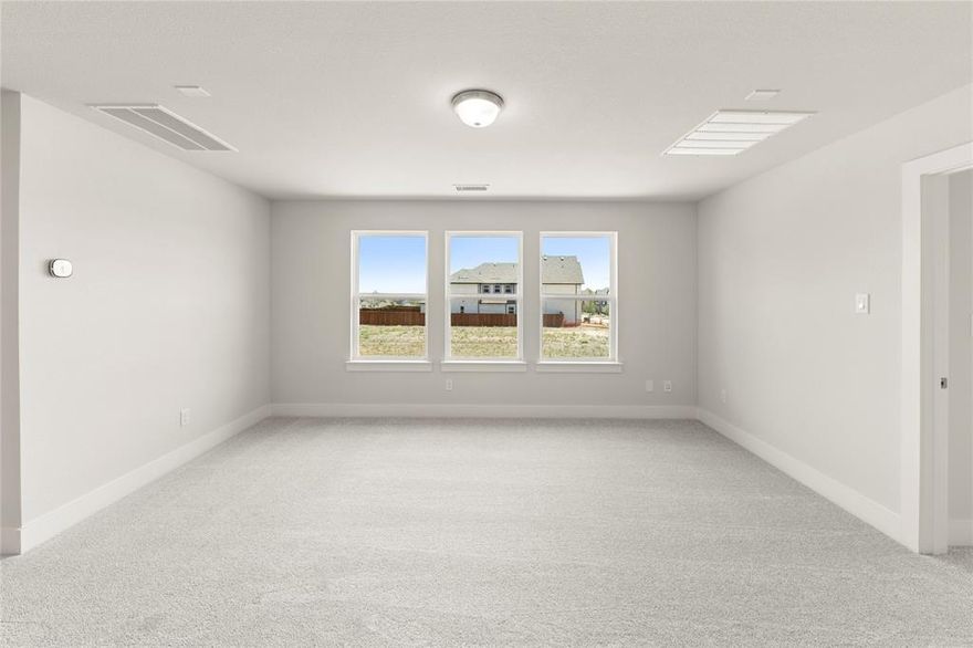 MLS# 20911207 - Built by First Texas Homes - Ready Now! ~ Up To $20K Closing Cost Assistance for Qualified Buyers on Select Inventory! See Sales Consultant for Details! Discover versatile living in this stunning home on an oversized lot, showcased by an extended covered patio perfect for outdoor entertaining. Elegant wood floors throughout the first level create a warm, inviting atmosphere. Featuring a flexible downstairs study, bedroom and upstairs media room, bedroom option, this 5-bedroom, 3-bath home adapts to your lifestyle. The thoughtful design maximizes space and functionality.