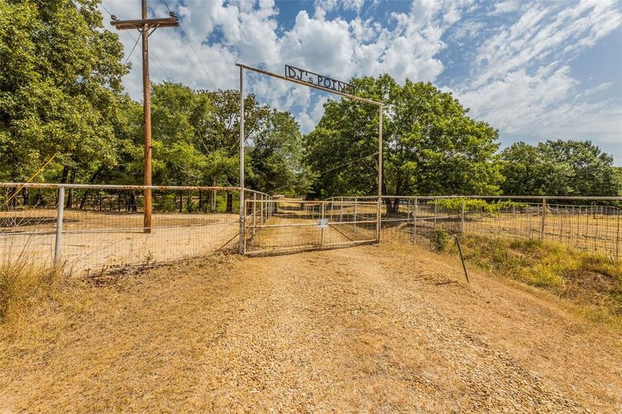 Drive thru the front gate and feel the peace fall upon you. This 59.11 acres has 2 homes, a ranch hand apt above the large workshop. Within the acreage, there are 7 ponds, 7 pole barns, a feed barn with inside storage and a covered area for hay storage, there's additional hay storage beside the workshop which can be used for parking vehicles under cover, 13 different fenced in areas. One of the homes is a 2-2-2 living area-2CP cabin-like home (appx 1504 sq ft). The other home is a 4-2 mobile home (appx 1252 sq ft). Both homes have fenced in front and back yards, central h & air, utility areas, full kitchens. The apt above the workshop has a living area-dining area, bedroom, bath and a kitchenette with built in cabinets and sink,but no appliances, the apt has a window unit and electric heaters were used for heat. Included in the 59.11 acres is a 42.9 acre tract with the address of 965 FM 751. Not enough space on MLS to put it on there for address or legal description