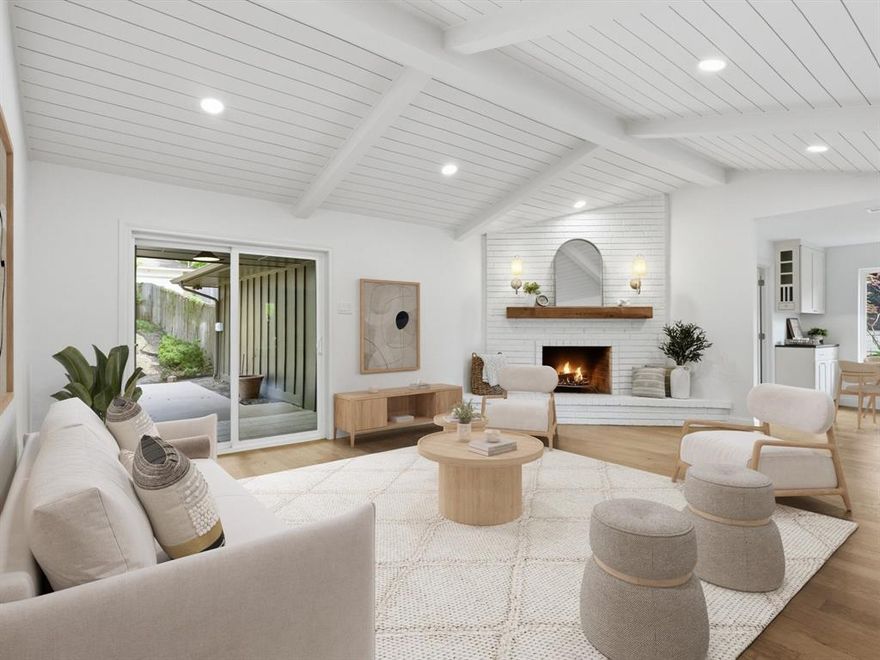 Beautifully updated while preserving its original warmth and character, this exceptional 2,228 SF residence offers a seamless blend of classic design and modern-day functionality. Featuring 4 bedrooms and 2.5 baths—including a convenient Jack-and-Jill layout—the home is filled with natural light, gorgeous engineered hardwood floors, and an inviting living area highlighted by custom ceiling detail and a striking fireplace hearth. The fully renovated kitchen showcases custom cabinetry, countertops, updated fixtures, and new appliances. Extensive improvements include complete PVC plumbing replacement—including the sewer line to the street—along with aluminum wiring remediation, copper pigtails, and a new panel approved by the City of Dallas. All improvements permitted and ready for use! Additional updates include a new roof (March 2026), gutters, windows, remodeled baths, and garage door. Private backyard and rear-entry 2-car garage complete this exceptional home.