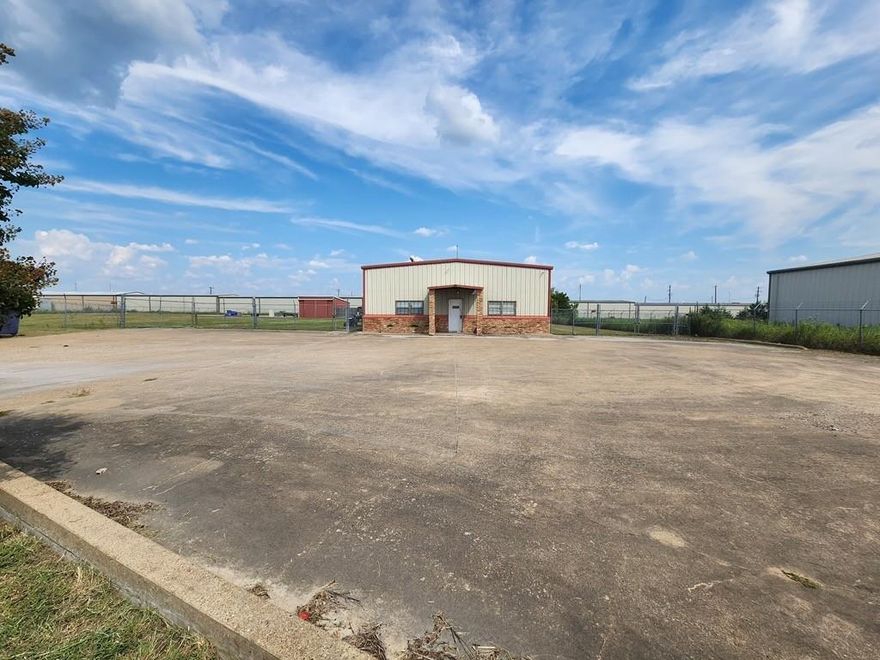 Great business opportunity.  Lots of room for growth.  Offices, conference room, bay areas, storage, kitchen, and additional storage-warehouse space with extended concrete on both sides.  Fully fenced with large cocrete parking lot and additional room for parking or expanding. Located in the busy business park and easy access.