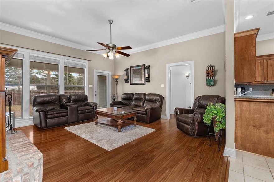 Tuscany Villas Subdivision – This beautiful home offers a warm and inviting living room featuring a gas fireplace and a lovely view of the covered patio. The eat-in kitchen provides abundant counter space, a pantry, and excellent storage options. A large utility room adds even more convenience with additional storage. The gorgeous primary suite includes a tray ceiling and a spacious primary bathroom with a double vanity, separate jetted tub, and walk-in shower. Additional bedrooms are generously sized to accommodate a variety of needs. Outside, you’ll enjoy a large corner lot with a privacy fence and a covered patio perfect for relaxing or entertaining. The home features ceramic tile and luxury vinyl tile flooring, along with ceiling fans throughout. A 2-car garage completes this fantastic property.