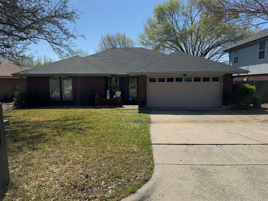 Charming 3-bedroom, 2-bath brick home in Fox Hollow, NRH, just minutes from Richfield Park. Features an open living area with vaulted ceilings and a gas fireplace, plus a kitchen with granite counters and stainless-steel appliances. The spacious primary suite, includes double sinks and double closets Enjoy a large backyard with mature trees and a huge, covered porch. Located in Birdville ISD, Lifetime transferable foundation warranty included.