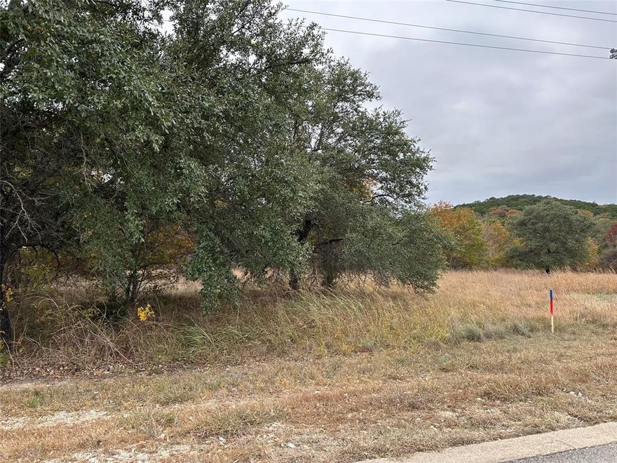 Discover the potential of building your dream home on this beautiful .30 acre undeveloped lot, located in the prestigious gated community of The Retreat in Cleburne, Texas. Nestled amidst rolling hills and scenic views, this lot offers the perfect canvas to design a home that suits your vision, all while enjoying the tranquility of resort-style living.  Residents enjoy exclusive access to world-class amenities, including an 18-hole championship golf course, a resort-style swimming pool, a state-of-the-art fitness center, tennis courts, hiking and biking trails, and a luxurious clubhouse featuring a full-service restaurant and bar.  Situated about 30 minutes from Fort Worth, The Retreat offers the perfect blend of peaceful countryside living and urban convenience. Whether you envision a primary residence or a weekend getaway, this lot provides a rare opportunity to own a piece of paradise in one of Texas’s most sought-after communities. Owner does not have a survey for property, so this will be at the buyers expense to obtain. In order to abide by the Community Covenants and Restrictions there are red and blue stakes to help identify the lot discretely. Please find the CCR, The Retreat building packet, and approved builders attached in the Transaction Desk. Pictures will be posted tomorrow.