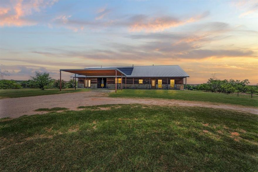 North Texas Horse Property situated on 49+ Acres, located 30 minutes NW of Fort Worth and only minutes from the small town of Boyd. This estate offers multiple homes, level to rolling terrain, cross-fenced pastures, lighted arena, 10-stall barn with runs, several out buildings, shop, pipe fencing, electric gated entrance and covered trailer parking. 

The main home offers 2,644 sq. ft. of air-conditioned living space, including 3 bedrooms and 2 bathrooms. Additionally, a fourth bedroom, ideal for mother-in-law quarters, is located across a breezeway for added privacy. The kitchen is equipped with an abundance of cabinets, stainless steel appliances, breakfast bar and granite countertops. The spacious living area, open to the kitchen, boasts a floor-to-ceiling stone fireplace, perfect for cold winter evenings and don’t forget about the long covered patio that provides a relaxing spot for morning coffee before tending to livestock. The guest house, is a charming farmhouse situated towards the front of the property. It includes 2 bedrooms, 2 bathrooms, office, wood floors, a metal roof and a fenced yard. The third residence is a well-maintained 3-bedroom, 2-bathroom mobile home, suitable for guests, ranch help, or as a rental income opportunity. Country living with city conveniences nearby. Welcome home to your family compound and country estate. Call for a private tour today!

*Buyer unable to sell other home & secure financing*