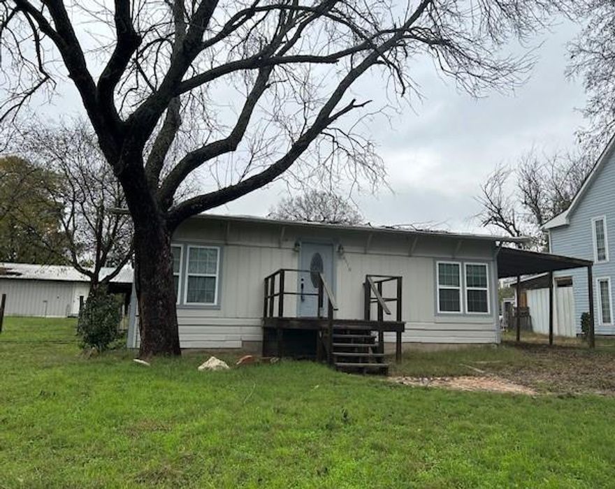 Great value on this cute 1 bedroom with office on almost a half an acre. Office could be a 2nd bedroom as well. Spacious living room. Updated kitchen has refrigerator, microwave, and electric range. Countertops are accented with a pretty backsplash. Kitchen dining combo. Newer washer and dryer included! Updated central heat and air. Utility connections in the bathroom that has a separate shower. Detached 2 car garage plus a workshop with adjoining carport space at the side plus another space behind the workshop. Room for all your toys and equipment!