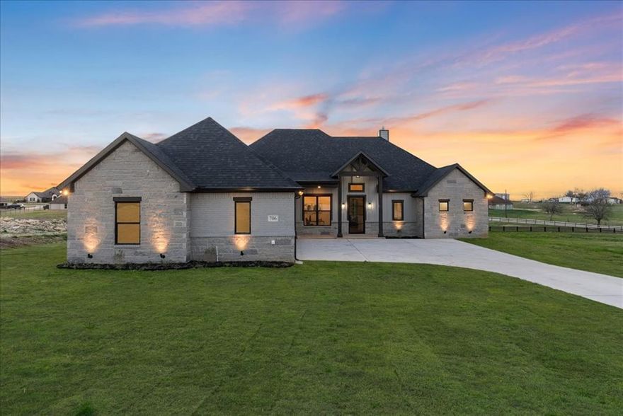 This beautifully designed home features 3 bedrooms, 2.5 baths, an office, and a 3-car garage in an open-concept layout. The gourmet kitchen offers tons of cabinet and counter space, granite countertops, and a dry bar, flowing seamlessly into the dining and living areas—perfect for entertaining. Vaulted ceilings enhance the spacious feel, while an oversized utility room adds convenience.  Enjoy year-round comfort with two fireplaces, including one in the covered patio’s outdoor living space. The expansive 1-acre lot provides ample space for relaxation or future customization.  A perfect blend of luxury and tranquility.