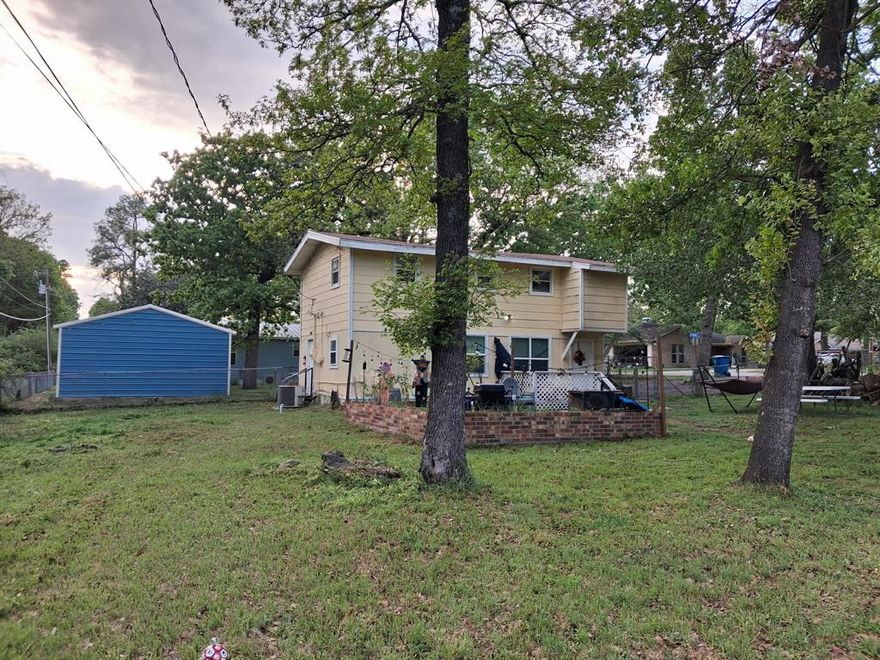 This well keep home is ready for it new owner. This two story home features, 3 bedrooms, 2 full bathrooms, open floor plan, and a very large double lot for entertaining at the fire pit. Home was renovated several years back with included tank less hot water heater, new windows, new appliances and update bathrooms and kitchen. This would be great for a first time home buyer, Airbnb, or a weekend lake spot.