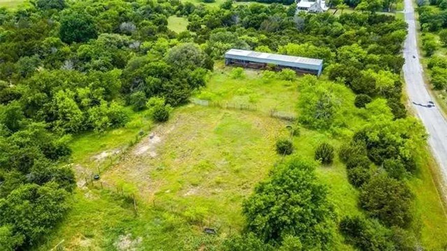 The best views on over 15 acres in Parker county are here! Enjoy rolling hills nestled among the trees and living your best life building the home of your Texas dreams. Property already has a well and electricity and fencing ready to for your vision of what could be! Home on property is currently inhabitable but could be restored with the right skillset and resources.   Don't miss out this opportunity!