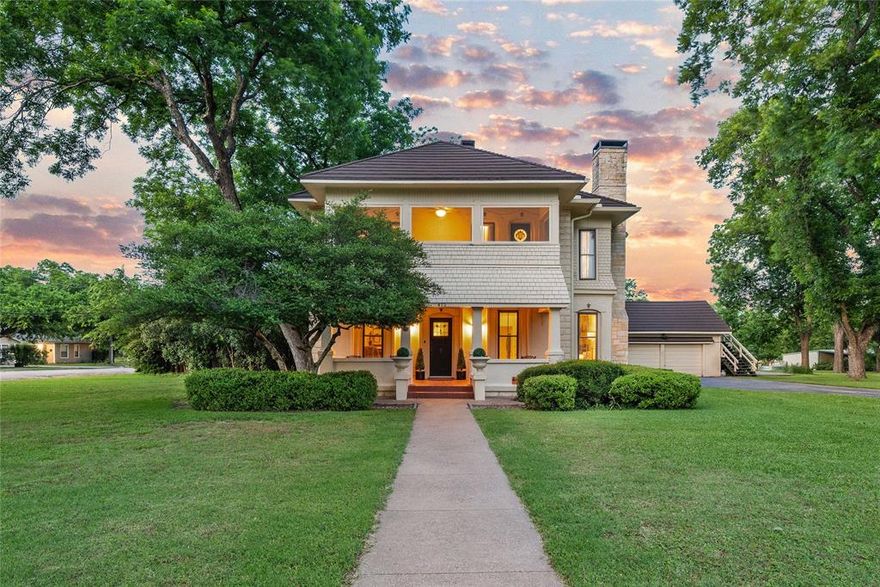 Step into timeless elegance with this iconic 1920s-era home, affectionately known in the community as the “Orbeck House.” Built atop hand-crafted cement blocks made on-site and finished with plaster, this 2,490 sq ft two-story residence blends historical craftsmanship with thoughtful modern updates.

Inside, you’ll find 3 spacious bedrooms, 2.5 bathrooms, and two inviting living areas with soaring vaulted ceilings and cozy wood-burning fireplaces—ideal for gatherings year-round. The beautifully remodeled kitchen is a chef’s dream, featuring stainless steel appliances, a farmhouse sink, generous cabinetry, and ample workspace.

Charming architectural details abound, including handcrafted woodwork and custom stained-glass doors that add warmth and character throughout. Upstairs, the expansive primary suite boasts a luxurious en-suite bathroom and private balcony—perfect for morning coffee or evening sunsets. Two additional bedrooms, a second full bath, and a dedicated office provide plenty of room for family, guests, or remote work.

A spacious 3-car garage with an upper-level storage room offers convenience and flexibility. Mature hardwood trees frame the exterior, and the large covered deck overlooking the neighborhood adds even more charm and functionality.

Lovingly updated over the years, this remarkable home maintains its original soul while offering the comforts of modern living. With its rare combination of heritage, design, and craftsmanship, it's no wonder this is one of the most admired homes in Bosque County.

Don’t miss this opportunity to own a true local treasure—schedule your private showing today!