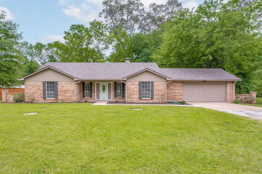 Looking for a move-in ready home with modern upgrades and a welcoming vibe? You’ve found it here! This cozy 3-bedroom, 2-bathroom home has been updated with stylish touches that make it feel brand new, while still offering the warmth of small-town living.
Inside, you’ll love the open layout that makes the living, dining, and kitchen areas feel connected and spacious—perfect for hosting or just kicking back. The kitchen has been upgraded with granite countertops and stainless steel appliances, giving you a sleek space to cook and hang out. The new vinyl flooring and carpet in the bedrooms add a fresh, clean feel throughout the house. The home has also been freshly painted inside and out, plus it has new rain gutters—so you can skip the maintenance and start enjoying your new space right away. Out back, there’s a big backyard ready for weekend barbecues, a play set, or just relaxing with a fire pit under the stars. Nearby, you will find the best hidden gem in East Texas- Circle M Crawfish and Trimble Farms.