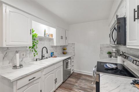 Photo of 12748 Burninglog Lane, Dallas, TX 75243 (MLS # 21205280)