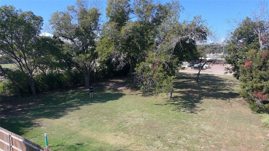 Great investment property on a large corner in Whitney Texas. Located in the heart of downtown Whitney. The property is approximately 115' X 100' and zoned B-3, which allows for residential, commercial or multifamily construction. Prime location in between a daycare and newly opened Urgent Care as well as many other restaurants and businesses in the downtown area. Would make a great location for duplexes, office, retail... bring your imagination. Contact Listing agent for details of zoning.
Whitney is conveniently located under an hour North of Waco. Fort Worth is an hour drive North of Whitney.  Often called the “Getaway Capital of Texas,” Lake Whitney is renowned for its crystal-clear water, scenic limestone bluffs, and laid-back atmosphere. It’s consistently ranked among the best fishing lakes in Texas. Offering ideal hiking locations, boating, water skiing, scenic views and a welcoming small-town vibe, cute downtown area within walking distance; don't miss your opportunity to be a part of it all!  All information provided by seller to the best of their knowledge and deemed reliable but not guaranteed. Buyer or buyer’s agent to verify all information provided. Buyer will need to purchase survey.