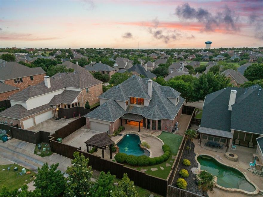 Welcome to an exceptional luxury residence in the highly sought-after community of Castle Hills, where refined living meets everyday convenience. Renowned for its expansive master-planned design, resort-style amenities, and vibrant atmosphere, this prestigious neighborhood offers an elevated lifestyle just 25 mins from DFW Airport, within 10 mins premier dining, shopping, and entertainment.
With extensive renovations completed between 2023-2026. Thoughtfully curated finishes and a timeless design create a seamless blend of sophistication and comfort throughout. The interior features high-quality hardwood and engineered wood flooring, fresh full-home paint, and beautifully refinished kitchen cabinetry. The gourmet kitchen is enhanced with upgraded countertops and backsplash, offering both elegance and functionality.
The primary suite serves as a private retreat, highlighted by a spa-inspired remodeled shower and a custom designed closet. Expansive windows throughout the home are adorned with elegant plantation shutters and custom honeycomb blinds, filling the space with natural light while maintaining energy efficiency and style.
Designed for both comfort and versatility, the home features a highly desirable layout with the primary suite and a guest bedroom on the first floor. Upstairs, find three additional bedrooms, a spacious game room, and a dedicated media room—perfect for elevated entertaining and relaxed living.
Step outside into your private backyard oasis, complete with a sparkling pool, updated systems, and resurfacing. The backyard features a professionally installed turf area and an elegant pergola, creating a resort-style setting that enhances the poolside experience and offers the perfect space for relaxation and entertaining.
Additional enhancements include all-new energy-efficient Marvin Windows, a new sliding backyard door, updated window treatments, a replaced pool pump system, resurfaced pool area, and a newly installed backyard gate motor.