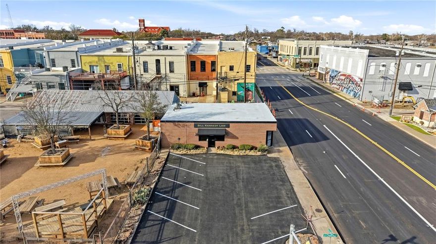 Position your business for visibility and long-term success at 121 S Austin Ave in downtown Denison. Located on the hard corner of Austin Ave & Chestnut St this commercial office building offers exceptional exposure in one of Denison’s most recognizable & walkable downtown locations. With daily traffic passing by & strong street presence on two sides this is an ideal opportunity for a professional service creative firm or growing business looking to establish a downtown footprint. The interior is thoughtfully laid out & currently configured for a law practice offering a flexible & functional design that can easily adapt to a variety of business uses. Inside you’ll find an open flex space well-suited for collaborative teams or client reception two private offices for focused work a large conference room ideal for meetings or presentations two restrooms & a dedicated storage & equipment closet. The space balances privacy and openness making it practical for both client-facing & operational needs. A rare advantage for a downtown property this location includes its own private parking lot providing convenient parking for owners employees & customers—an invaluable asset in a central business district. The building offers approximately 1,677 square feet of office space and sits on a corner lot that maximizes visibility & accessibility. Beyond the property itself this location benefits from the continued growth & momentum of the Sherman–Denison area. With major corporate investment & expanding employment opportunities the Texoma region is experiencing increased demand for commercial & professional space. Businesses positioned in downtown Denison enjoy proximity to restaurants shops entertainment & community events. This property delivers strong exposure a functional office layout private parking & a premier downtown address—making it a compelling opportunity for business owners ready to grow alongside one of North Texas’ most promising markets.