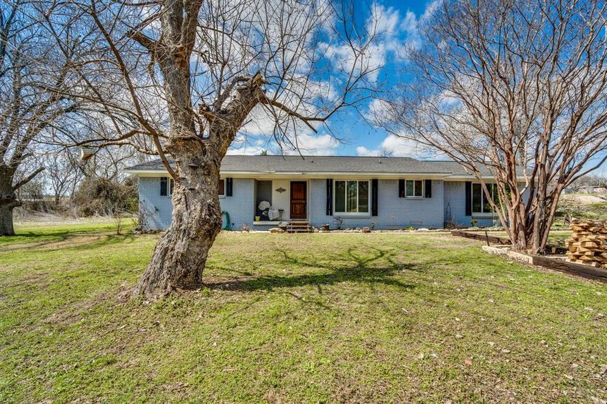 INVESTMENT OPPORTUNITY! CASH ONLY  Highly sought after, fast growing area! Great location with access to Highways 35 and 287 Business! With over an acre of land this could be a great property to build your retail space or any business! Property is zoned residential but could possibly be changed to commercial. Property has been renovated over several years and with different owners. Sellers have no knowlege regarding the renovations   done prior to their purchasing the property. The large living room with the vaulted ceiling was once a garage and then converted into a living room. There was a fire in the living room area in 2016. Permits were required for the new construction in that area of the house. The electrical work from the living room to the master bathroom along the front half of the home was replaced and has a new electrical box. The dining room, sitting area with stone fireplace and the eat-in kitchen area all have hardwood floors. The dishwasher and microwave do not work. The front half of the home has HVAC and the back half of the house has a window unit. The heat on the window unit does not work. There are also two electric water heaters in the home. The water heater for the back half of the home was recently replaced. The the gameroom and the hallway to the back half of the home have stained concrete floors. The laundry room, bathroom and three bedrooms in that part of the home were once a three car garage. The sub-panel to the back half of the home is located in the middle bedroom. There is damage to the ceiling in the gameroom, some broken window panes throughout the home, and some damaged area's of flooring throughout the home. There is a well on the property but the seller does not use it. The gravity-fed septic system has three tanks, one of which is an overflow. There is a pool on the property that was filled in and buried prior to the sellers purchasing the home. Dining room table is for sale.
PROPERTY IS BEING SOLD AS IS, NO REPAIRS.